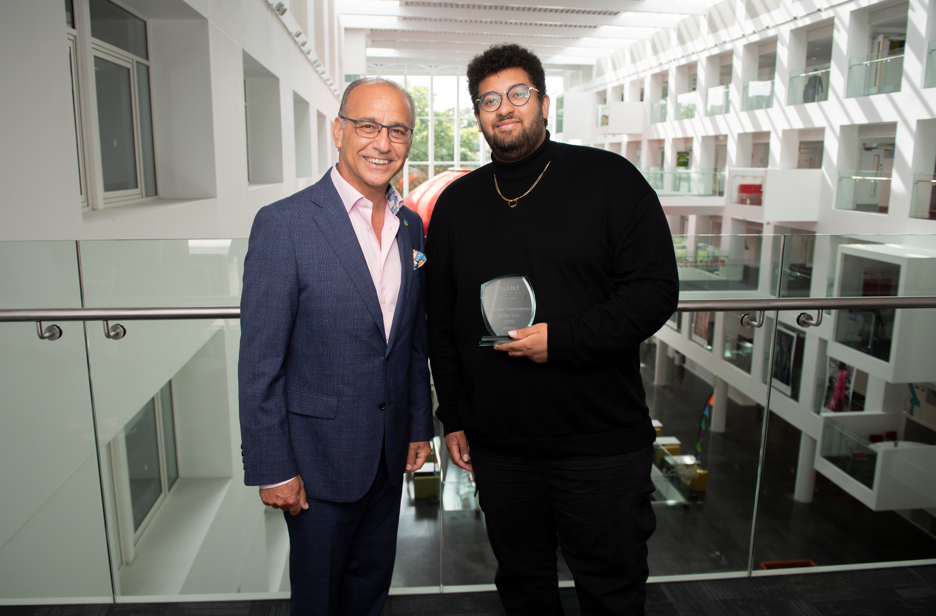 James Gayle, Founder of The Straw Hat Group, receiving an award